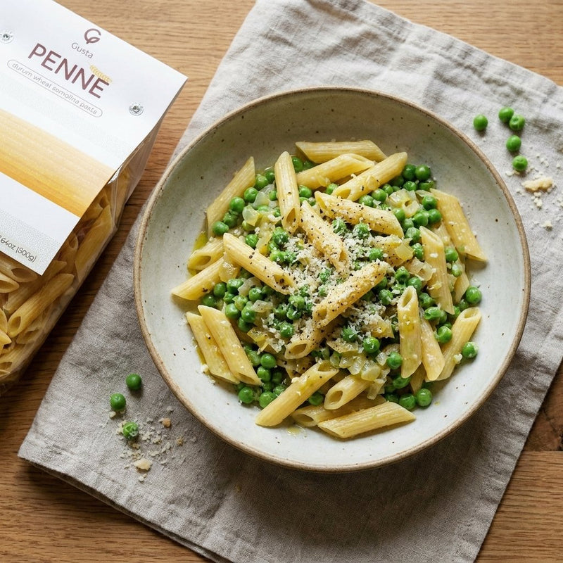Pasta e Piselli plated with Gusta Penne Rigate Pasta alongside