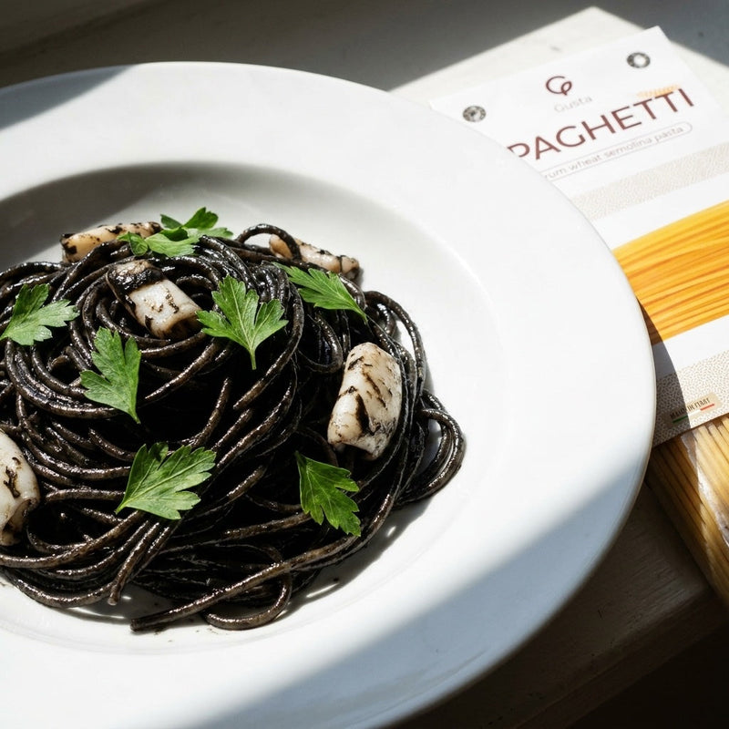 Spaghetti al Nero di Seppia plated, with the Gusta Spaghetti Pasta alongside