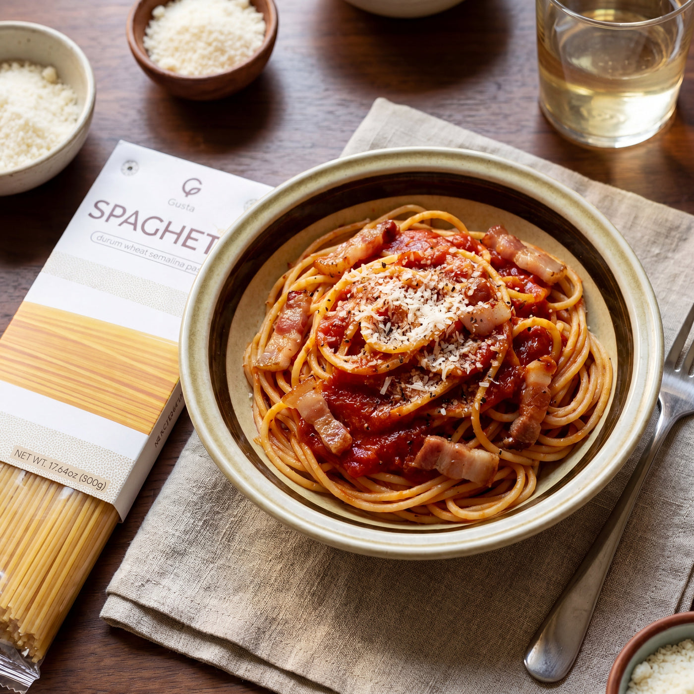 Spaghetti all'Amatriciana plated, with the Gusta spaghetti alongside